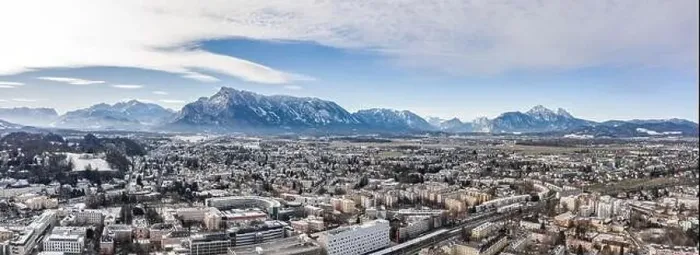 Framed Print : Panoramic aerial drone shot view of Salzburg aiglhof station with view of eastern bavarian alps mountain Framed Print : Panoramic aerial drone shot view of Salzburg aiglhof station with view of eastern bavarian alps mountain