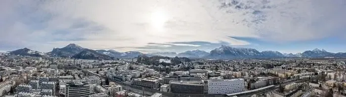 Framed Print : Panoramic aerial drone shot view of Salzburg aiglhof station with view of eastern bavarian alps mountain Framed Print : Panoramic aerial drone shot view of Salzburg aiglhof station with view of eastern bavarian alps mountain
