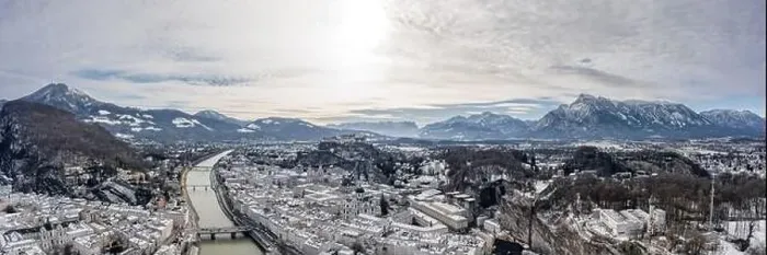 Framed Print : Panoramic aerial drone shot view of snoy Salzburg in winter morning Framed Print : Panoramic aerial drone shot view of snoy Salzburg in winter morning