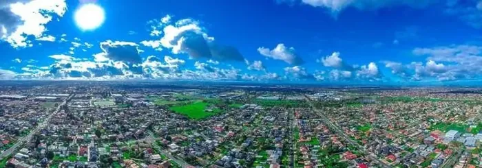Framed Print : Panoramic aerial Drone view of Melbournes suburbs and CBD looking down at Houses roads and Parks Victoria Australia Framed Print : Panoramic aerial Drone view of Melbournes suburbs and CBD looking down at Houses roads and Parks Victoria Australia
