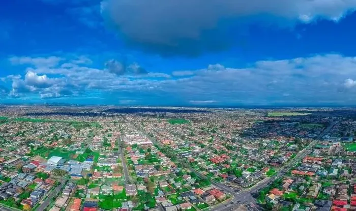 Framed Print : Panoramic aerial Drone view of Melbournes suburbs and CBD looking down at Houses roads and Parks Victoria Australia Framed Print : Panoramic aerial Drone view of Melbournes suburbs and CBD looking down at Houses roads and Parks Victoria Australia