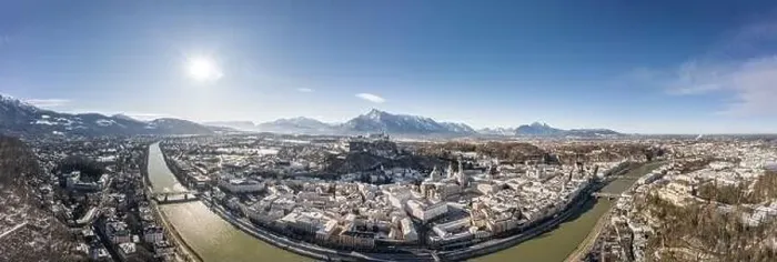 Framed Print : Panoramic aerial drone view of snowy Salzburg old town with river and Unesberg mountain in winter morning Framed Print : Panoramic aerial drone view of snowy Salzburg old town with river and Unesberg mountain in winter morning