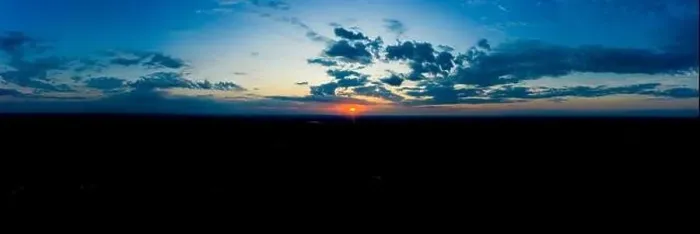 Framed Print : Panoramic aerial view of beautiful green tropical forest with mountains and majestic blue sky and clouds. Sunset Framed Print : Panoramic aerial view of beautiful green tropical forest with mountains and majestic blue sky and clouds. Sunset
