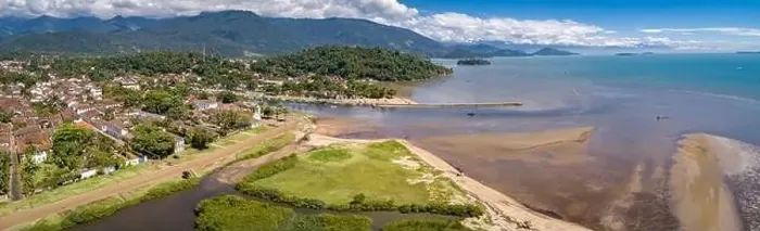 Framed Print : Panoramic aerial view to historic town Paraty, tidal river and Jabaquara with green mountains in bac Framed Print : Panoramic aerial view to historic town Paraty, tidal river and Jabaquara with green mountains in bac