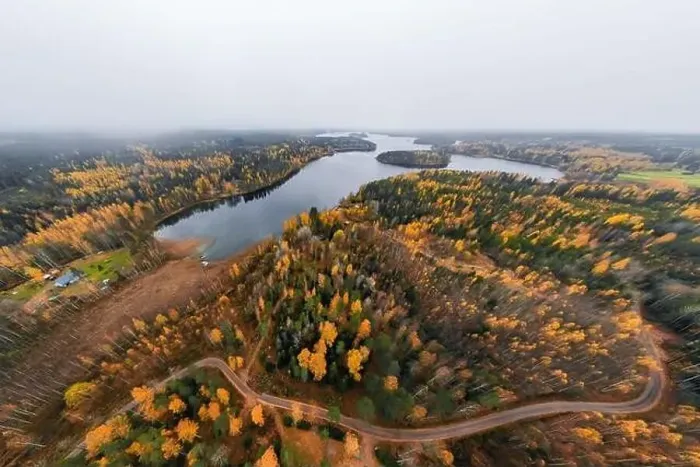 Framed Print : Panoramic aerial view of lake and colorful forests on a autumn day in Finland. Drone photography