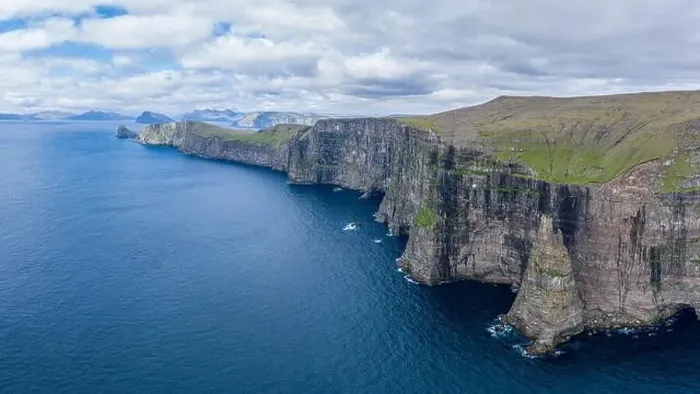 Framed Print : Panoramic aerial view from Sandoy island cliffs under the clouds, Faroe Islands Framed Print : Panoramic aerial view from Sandoy island cliffs under the clouds, Faroe Islands