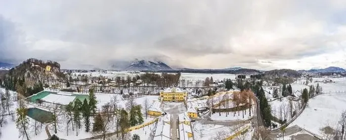Framed Print : Panoramic aerial view of Schloss Hellbrunn covered in snow with view of Untersberg near Salzburg Outskirts in winter Framed Print : Panoramic aerial view of Schloss Hellbrunn covered in snow with view of Untersberg near Salzburg Outskirts in winter