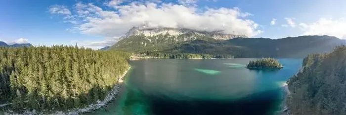 Framed Print : Panoramic aerial view of Zugspitze mountain heavy fog by Eibsee Lake in Germany