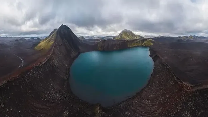 Framed Print : Panoramic drone shot of a vast highlands area in Iceland featuring a stunning crater lake surrounded by rugged Framed Print : Panoramic drone shot of a vast highlands area in Iceland featuring a stunning crater lake surrounded by rugged