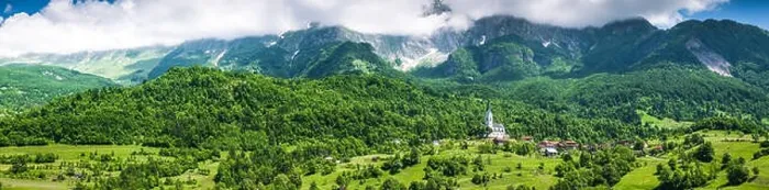 Framed Print : Panoramic image of Slovenia Julian Alps, farmland and village Framed Print : Panoramic image of Slovenia Julian Alps, farmland and village