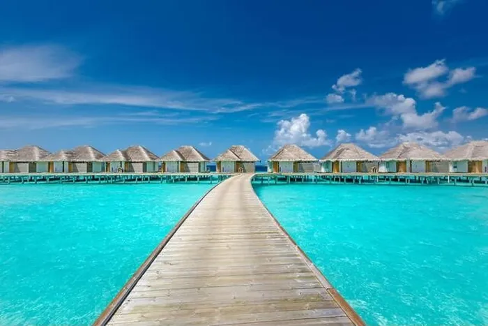 Framed Print : Panoramic landscape of Maldives beach. Tropical panorama, luxury water villa resort with wooden pier or jetty. Luxury travel destination background