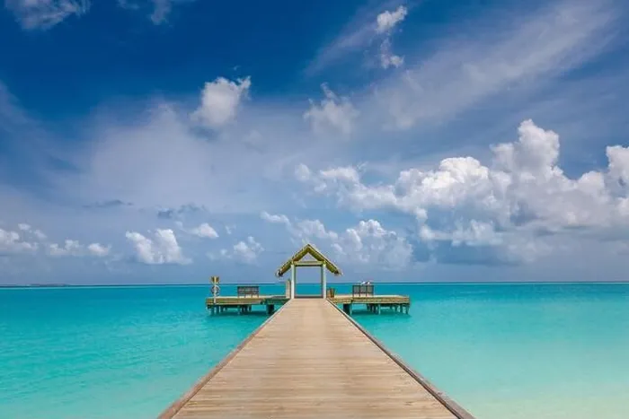 Framed Print : Panoramic landscape of Maldives beach. Tropical panorama, luxury water villa resort with wooden pier or jetty. Luxury travel destination background