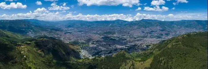 Framed Print : Panoramic View of the City of Medellin, Colombia Surrounded by Green Mountains on a Sunny Day Framed Print : Panoramic View of the City of Medellin, Colombia Surrounded by Green Mountains on a Sunny Day