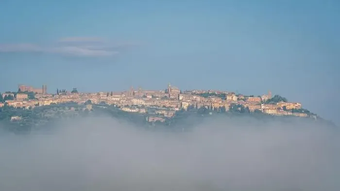 Framed Print : Panoramic view of city Montalcino beyond the morning clouds Framed Print : Panoramic view of city Montalcino beyond the morning clouds