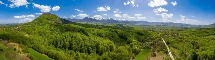 Framed Print : panoramic view from drone of the mountain with green hills and road in spring Framed Print : panoramic view from drone of the mountain with green hills and road in spring