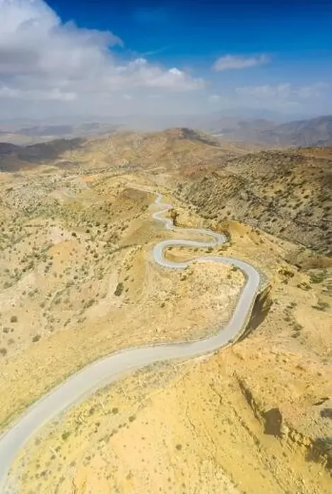 Framed Print : Panoramic view by drone of winding road towards Berhale crossing the dry landscape of Danakil desert Framed Print : Panoramic view by drone of winding road towards Berhale crossing the dry landscape of Danakil desert