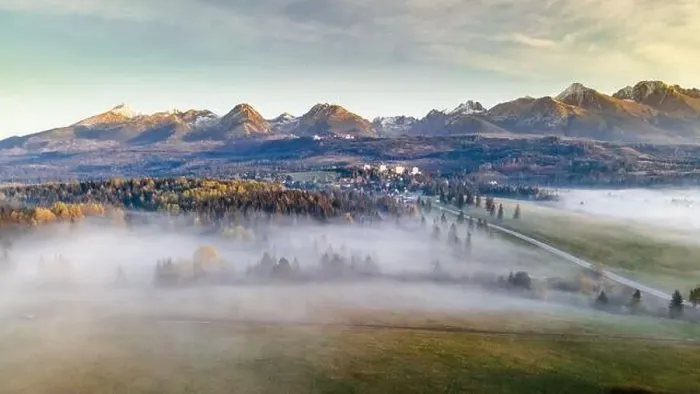 Framed Print : Panoramic View at High Tatra Mountains Ridge. Mist Over Trees at Autumn Sunrise. Aerial Drone View Framed Print : Panoramic View at High Tatra Mountains Ridge. Mist Over Trees at Autumn Sunrise. Aerial Drone View