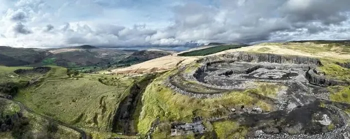 Framed Print : Panoramic view of a large open cast limestone quarry at Penwyllt in the Upper Swansea Valley in South Wales UK