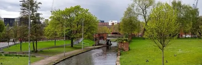 Framed Print : Panoramic view of Manchester Skyline on a spring day from Victoria Mills park, Miles Platting