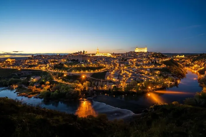 Framed Print : Panoramic view of the medieval center of the city of Toledo, Spain. It features the Tejo river, the Cathedral and Alcazar of Toledo, Spain Framed Print : Panoramic view of the medieval center of the city of Toledo, Spain. It features the Tejo river, the Cathedral and Alcazar of Toledo, Spain