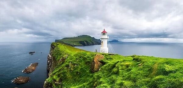 Panoramic view of old lighthouse on the Mykines island, Faroe islands, Denmark. Landscape photography
