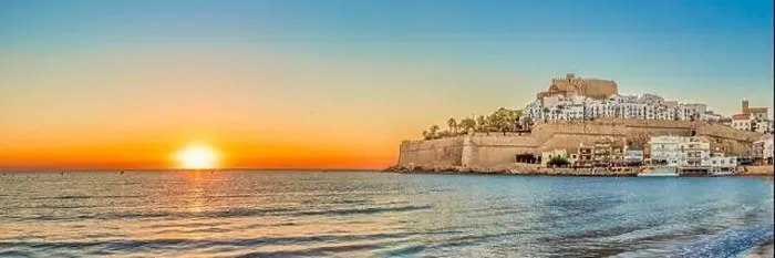 Framed Print : Panoramic view of Peniscola during sunrise, a coastal town in eastern Spain, Costa del Azahar, Province Castello, Spain Framed Print : Panoramic view of Peniscola during sunrise, a coastal town in eastern Spain, Costa del Azahar, Province Castello, Spain
