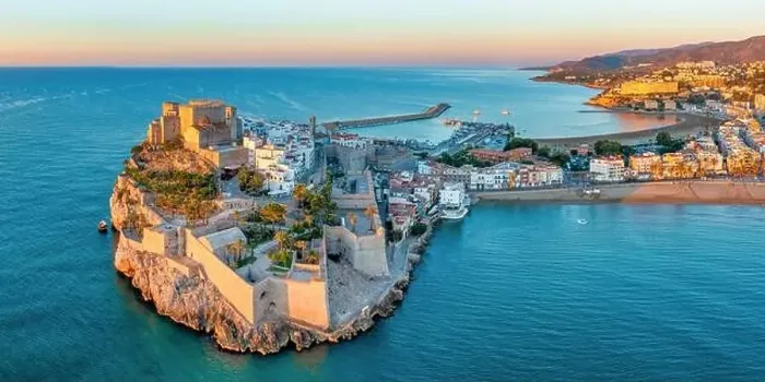 Framed Print : Panoramic view of Peniscola during sunrise, a coastal town in eastern Spain, Costa del Azahar, Province Castello, Spain Framed Print : Panoramic view of Peniscola during sunrise, a coastal town in eastern Spain, Costa del Azahar, Province Castello, Spain