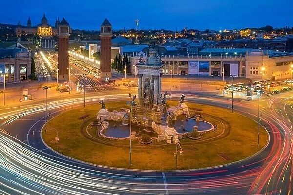 Panoramic view of Placa d'Espanya in Barcelona at night. This iconic square is located at the foot of Montjuic and it's a major landmark in Barcelona