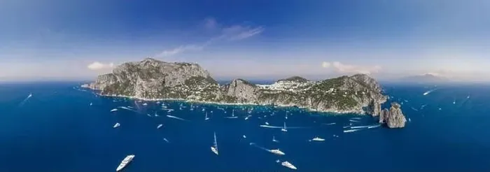Framed Print : Panoramic view of south Capri Island coastline and faraglioni limestone crags in Tyrrhenian sea Framed Print : Panoramic view of south Capri Island coastline and faraglioni limestone crags in Tyrrhenian sea