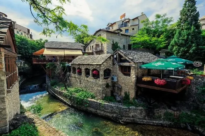 Framed Print : Panoramic View to the Spring and Green cityscape of Mostar, Bosnia and Herzegovina Framed Print : Panoramic View to the Spring and Green cityscape of Mostar, Bosnia and Herzegovina