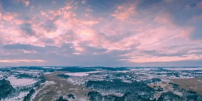 Framed Print : Panoramic top view of winter snowy countryside at sunset Framed Print : Panoramic top view of winter snowy countryside at sunset