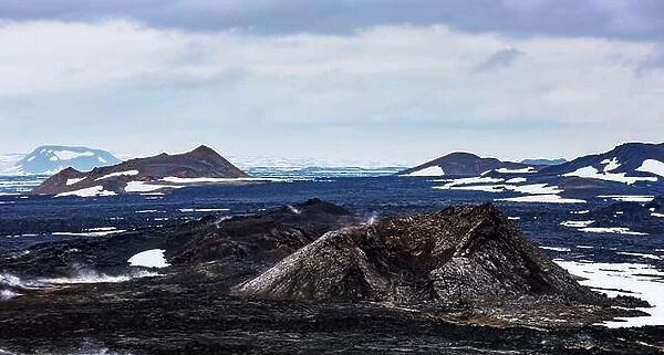 Panoramical view of Reeky lavas field in the geothermal valley Leirhnjukur, near Krafla volcano, Iceland. Landscape photography