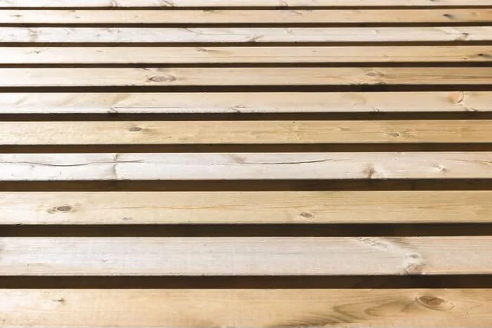 Framed Print : Parallel wooden slats in a natural rustic finish Framed Print : Parallel wooden slats in a natural rustic finish