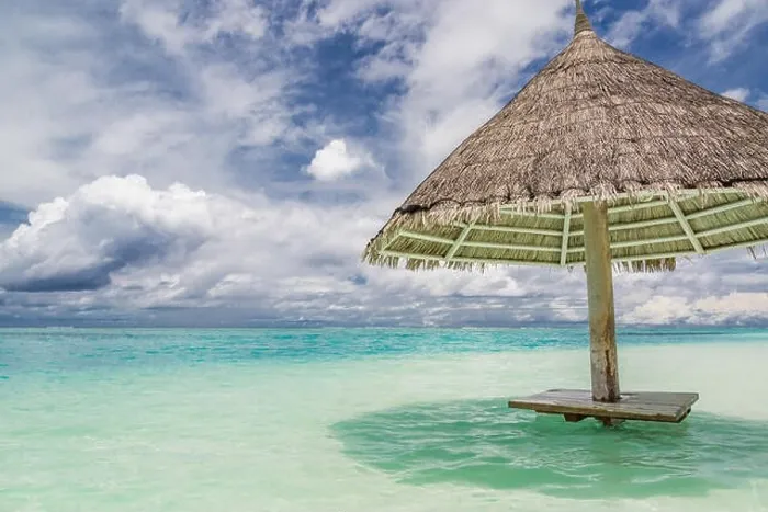 Framed Print : Parasol beach on the coast. White sand and blue water of the sea. Panorama at beach Framed Print : Parasol beach on the coast. White sand and blue water of the sea. Panorama at beach