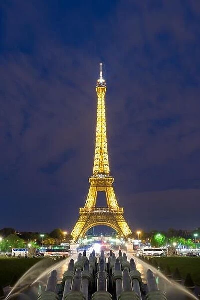 PARIS, FRANCE - May 8, 2016: Beautiful night scene of illuminated Eiffel Tower at dusk, Paris, France