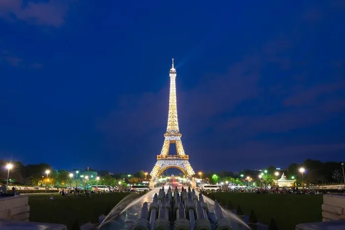 Framed Print : PARIS, FRANCE - May 8, 2016: Tourist sightseeing beautiful night scene of illuminated Eiffel Tower at dusk, Paris, France Framed Print : PARIS, FRANCE - May 8, 2016: Tourist sightseeing beautiful night scene of illuminated Eiffel Tower at dusk, Paris, France