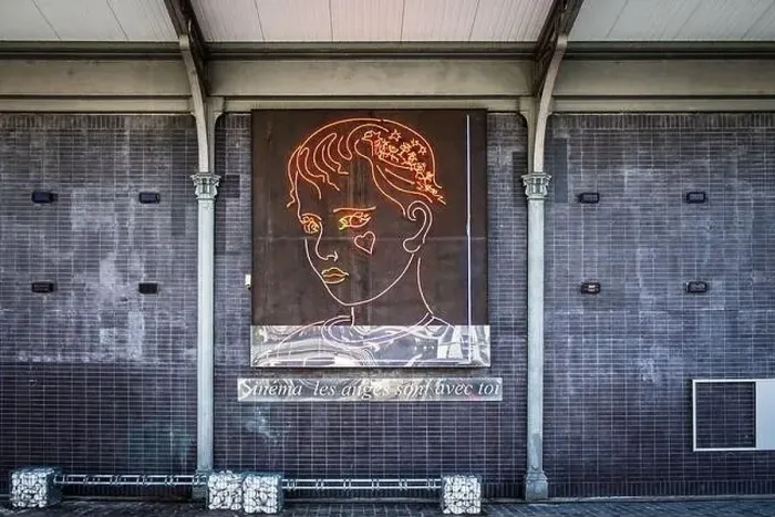 Framed Print : Paris, France, Oct 2022, view of a neon light representing an angel head by the Bassin of the Villette Framed Print : Paris, France, Oct 2022, view of a neon light representing an angel head by the Bassin of the Villette