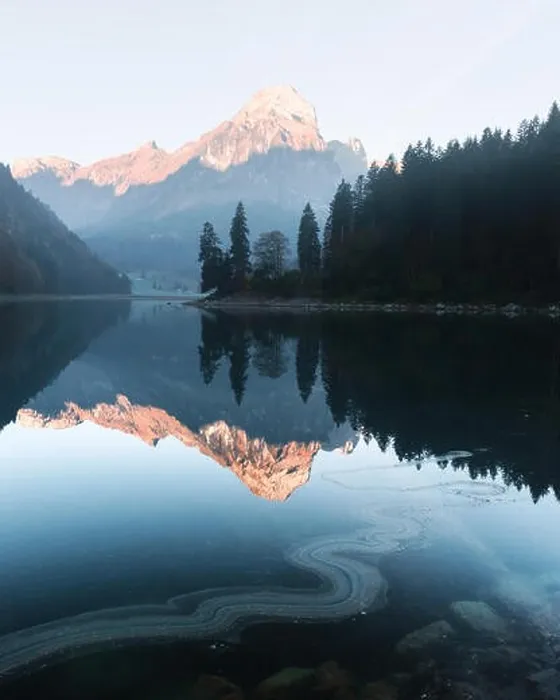 Framed Print : Peaceful autumn view on Obersee lake in Swiss Alps. Clear sky and mountains reflections in clear water. Nafels village, Switzerland Framed Print : Peaceful autumn view on Obersee lake in Swiss Alps. Clear sky and mountains reflections in clear water. Nafels village, Switzerland