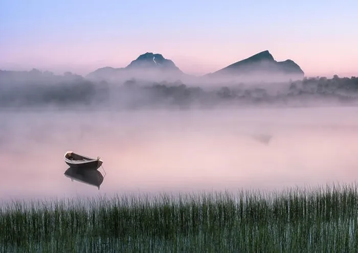 Framed Print : Very peaceful summer night with wooden boat and fog in Lofoten, Norway Framed Print : Very peaceful summer night with wooden boat and fog in Lofoten, Norway