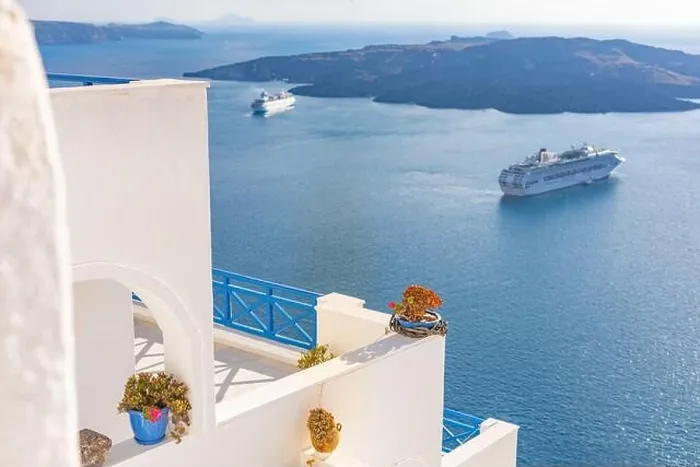 Framed Print : Peaceful view in Santorini, Greece with white architecture and flowers, cruise ships, Mediterranean summer mood, vacation and travel background Framed Print : Peaceful view in Santorini, Greece with white architecture and flowers, cruise ships, Mediterranean summer mood, vacation and travel background