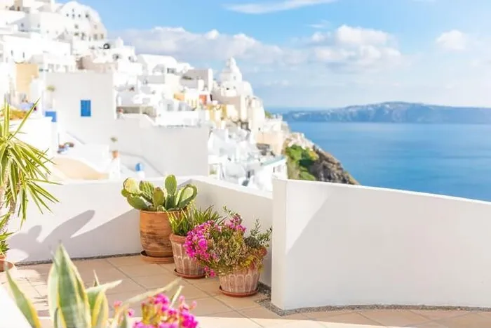 Framed Print : Peaceful view in Santorini, Greece with white architecture and flowers, cruise ships, Mediterranean summer mood, vacation and travel background Framed Print : Peaceful view in Santorini, Greece with white architecture and flowers, cruise ships, Mediterranean summer mood, vacation and travel background