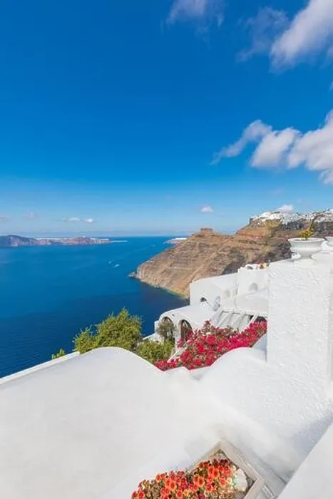 Framed Print : Peaceful view in Santorini, Greece with white architecture flowers. Mediterranean summer mood, vacation and travel background. Luxury destination Framed Print : Peaceful view in Santorini, Greece with white architecture flowers. Mediterranean summer mood, vacation and travel background. Luxury destination