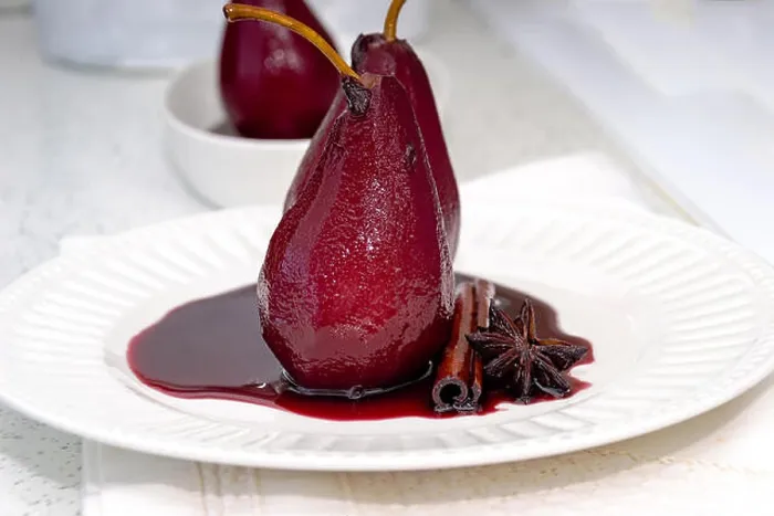 Framed Print : Pears poached in red wine, with star anise Framed Print : Pears poached in red wine, with star anise
