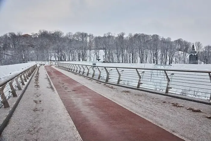 Framed Print : Pedestrian-bicycle bridge in Kiev in snowy weather Framed Print : Pedestrian-bicycle bridge in Kiev in snowy weather