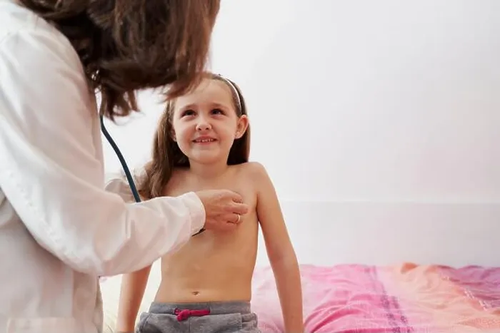Framed Print : Pediatric doctor examine little happy girl with stethoscope. Child, care. Home doctor concept Framed Print : Pediatric doctor examine little happy girl with stethoscope. Child, care. Home doctor concept