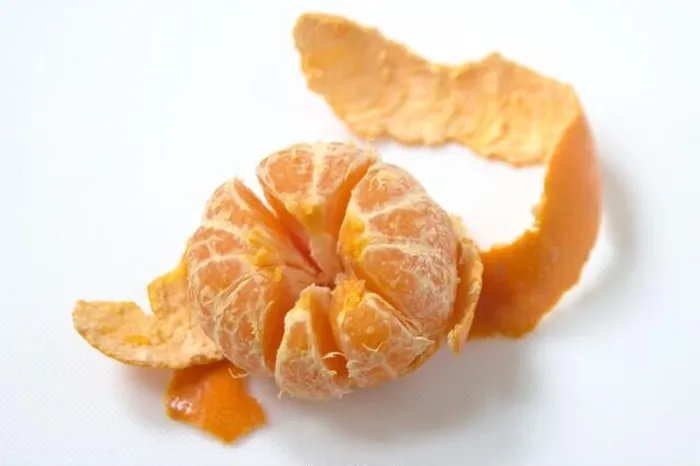Framed Print : Peeled satsuma on white surface - Framed Print : Peeled satsuma on white surface -