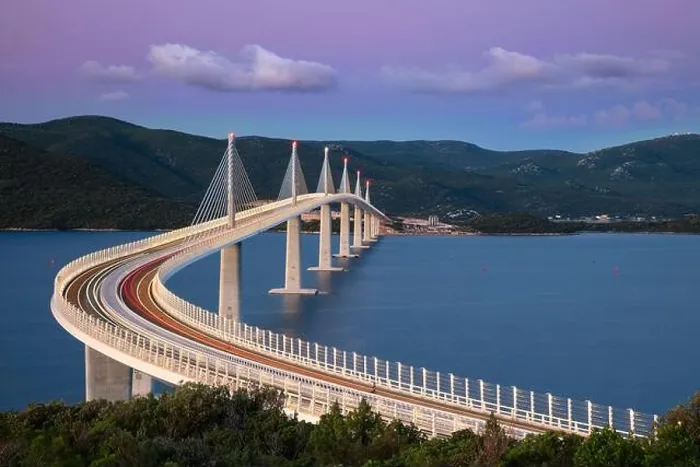 Framed Print : Peljesac Bridge, Croatia. Image of beautiful modern multi-span cable-stayed Peljesac Bridge over the sea in Dubrovnik-Neretva County, Croatia at sunri Framed Print : Peljesac Bridge, Croatia. Image of beautiful modern multi-span cable-stayed Peljesac Bridge over the sea in Dubrovnik-Neretva County, Croatia at sunri