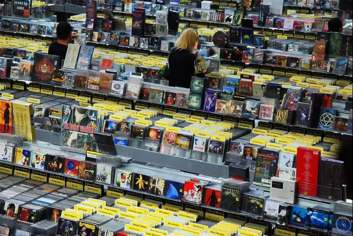 Framed Print : People search for their favorite music artists albums in Amoeba Music, a legendary record store in Los Angeles Framed Print : People search for their favorite music artists albums in Amoeba Music, a legendary record store in Los Angeles