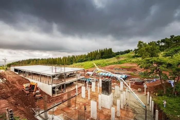 Framed Print : people working at site construction under rain cloud Framed Print : people working at site construction under rain cloud