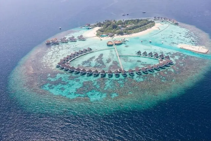 Framed Print : Perfect aerial landscape, luxury tropical resort or hotel with water villas and beautiful beach scenery. Amazing bird eyes view in Maldives, landscape Framed Print : Perfect aerial landscape, luxury tropical resort or hotel with water villas and beautiful beach scenery. Amazing bird eyes view in Maldives, landscape